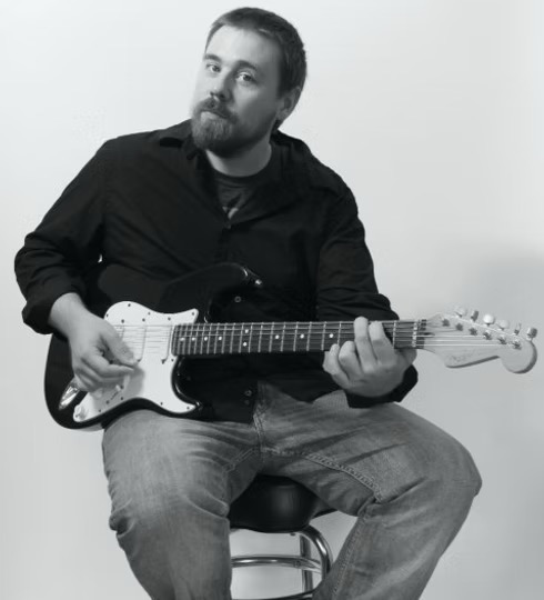 Gordon with electric guitar